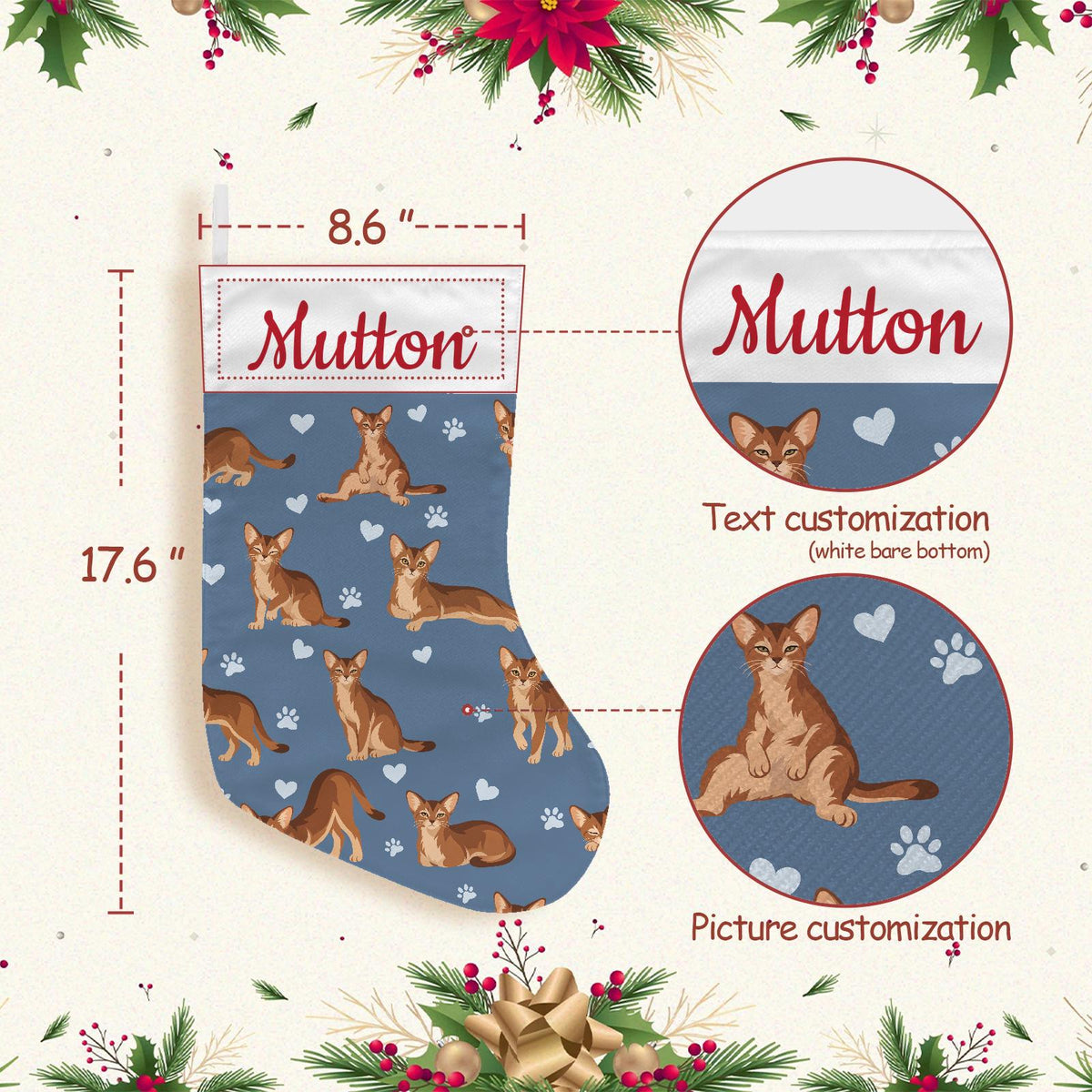 Abyssinian Christmas stocking on slate blue background with example name Mutton in red script on the white cuff; view 4.