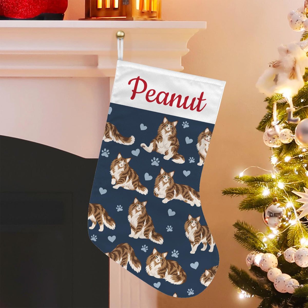 Norwegian Forest Cat Christmas stocking on deep navy background with example name Peanut in red script on the white cuff; view 1.