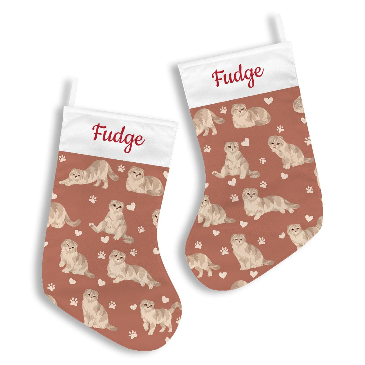 Scottish Fold Christmas stocking on muted terracotta background with example name Fudge in red script on the white cuff; view 3.