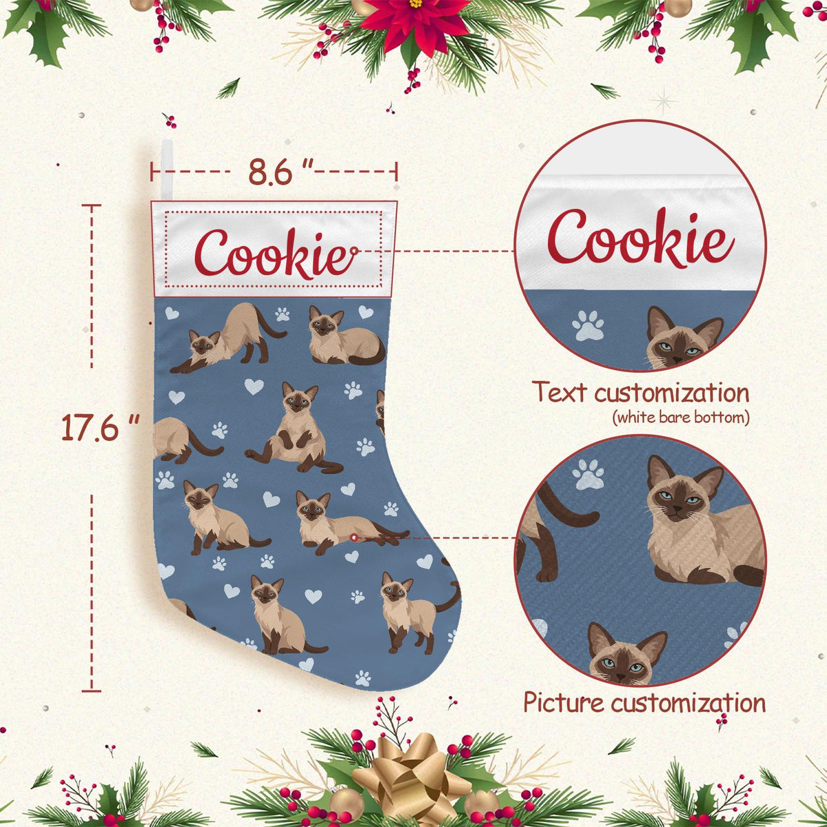 Tonkinese Christmas stocking on slate blue background with example name Cookie in red script on the white cuff; view 4.