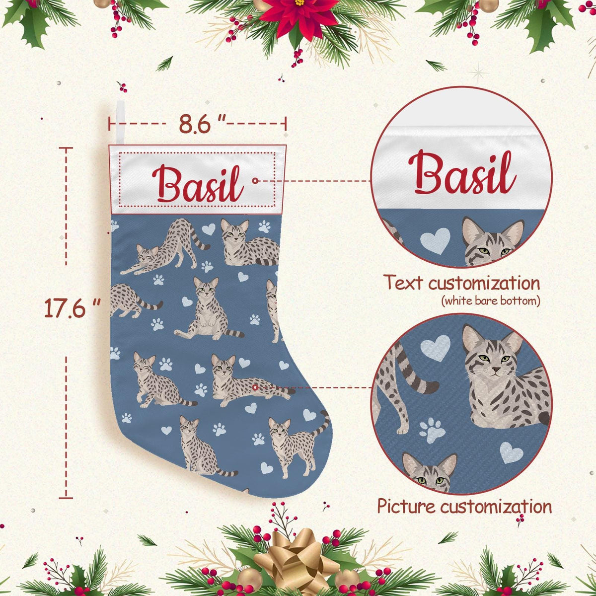 Egyptian Mau Christmas stocking on slate blue background with example name Basil in red script on the white cuff; view 4.