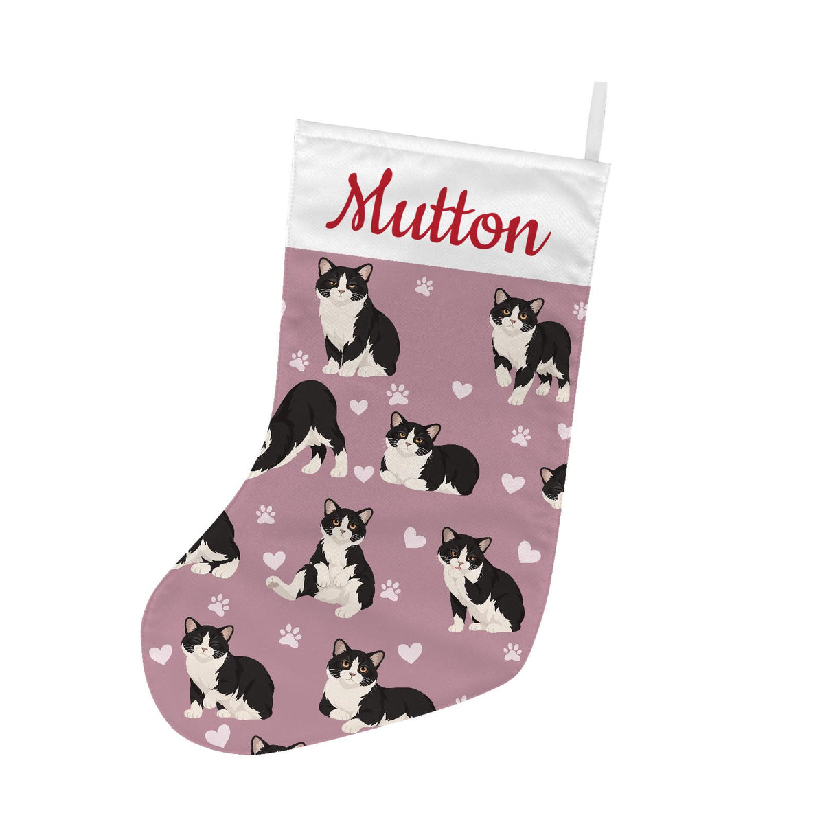 Manx Christmas stocking on dusty rose background with example name Mutton in red script on the white cuff; view 2.