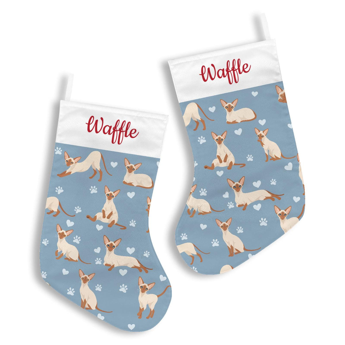 Colorpoint Shorthair Christmas stocking on dusty blue background with example name Waffle in red script on the white cuff; view 3.