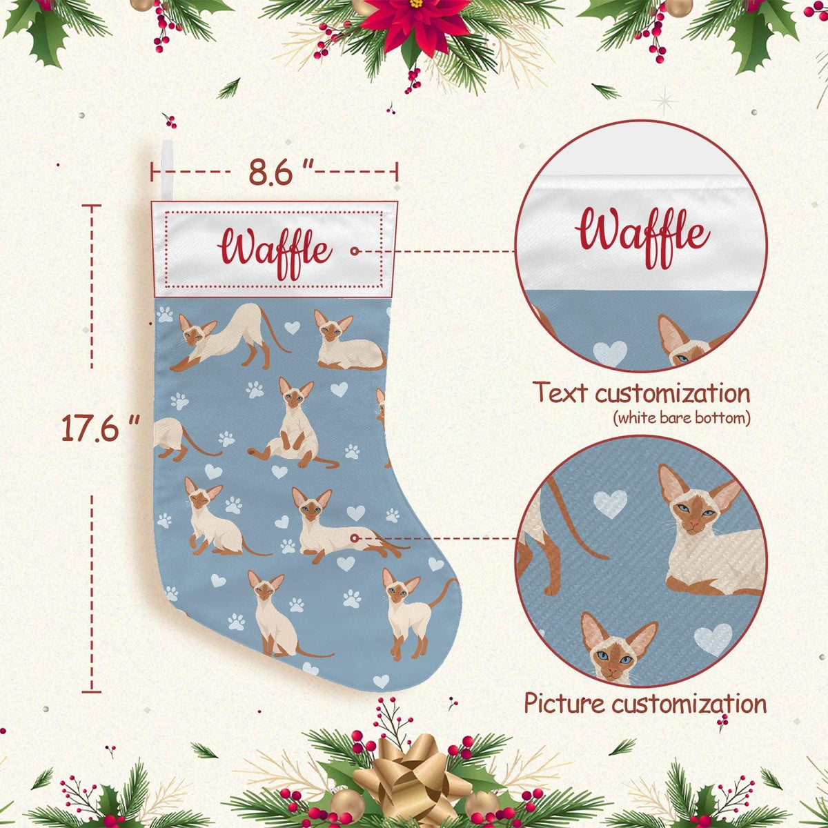 Colorpoint Shorthair Christmas stocking on dusty blue background with example name Waffle in red script on the white cuff; view 4.