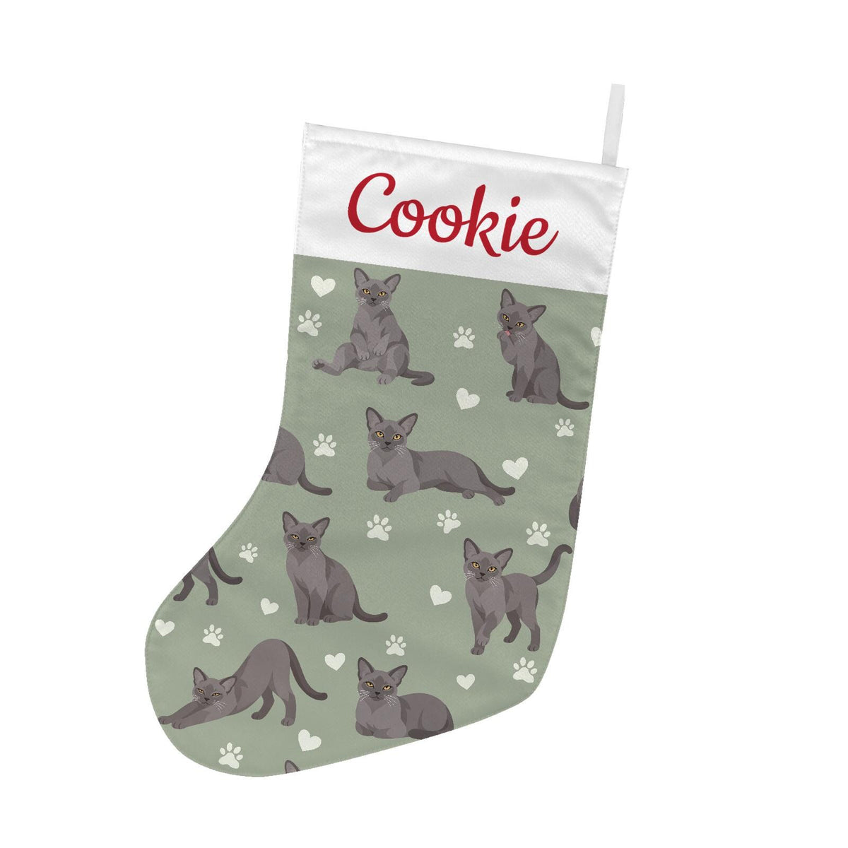 European Burmese Christmas stocking on soft sage background with example name Cookie in red script on the white cuff; view 2.