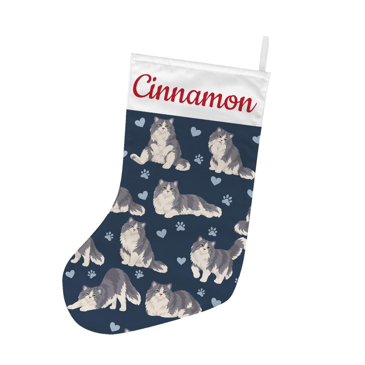Ragamuffin Christmas stocking on deep navy background with example name Cinnamon in red script on the white cuff; view 2.