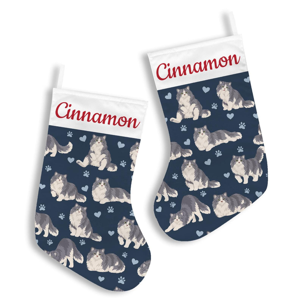 Ragamuffin Christmas stocking on deep navy background with example name Cinnamon in red script on the white cuff; view 3.