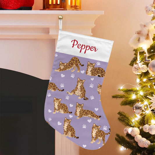 Bengal Christmas stocking on soft lavender background with example name Pepper in red script on the white cuff; view 1.