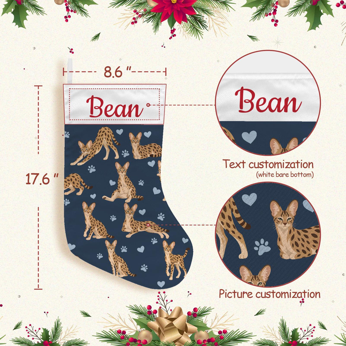Savannah Christmas stocking on deep navy background with example name Bean in red script on the white cuff; view 4.