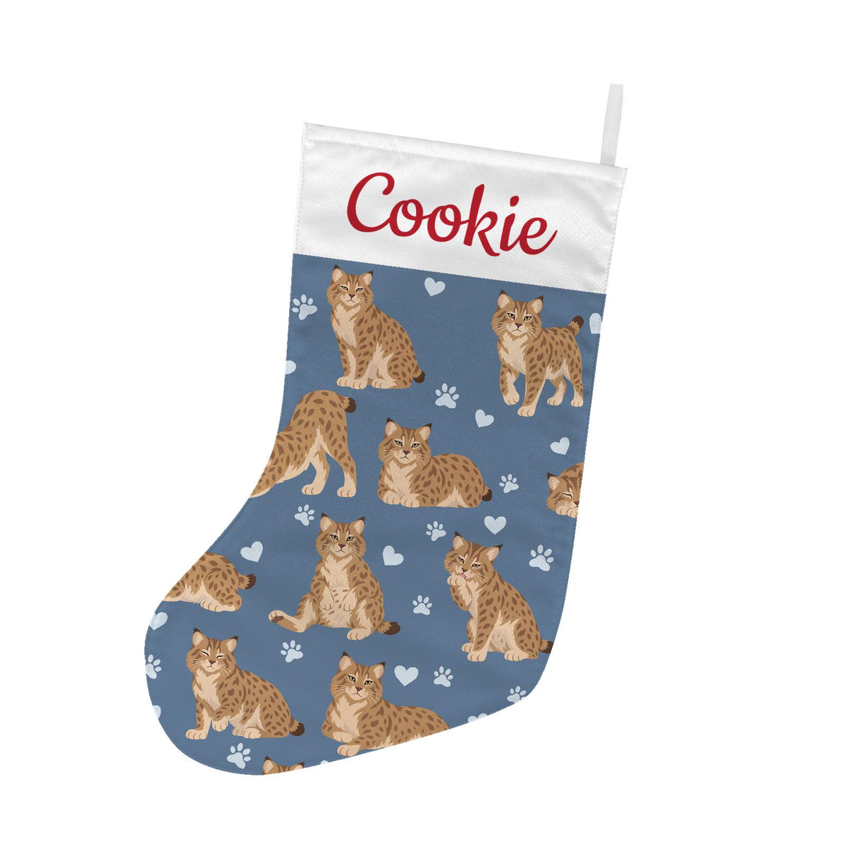 Pixie bob Christmas stocking on slate blue background with example name Cookie in red script on the white cuff; view 2.