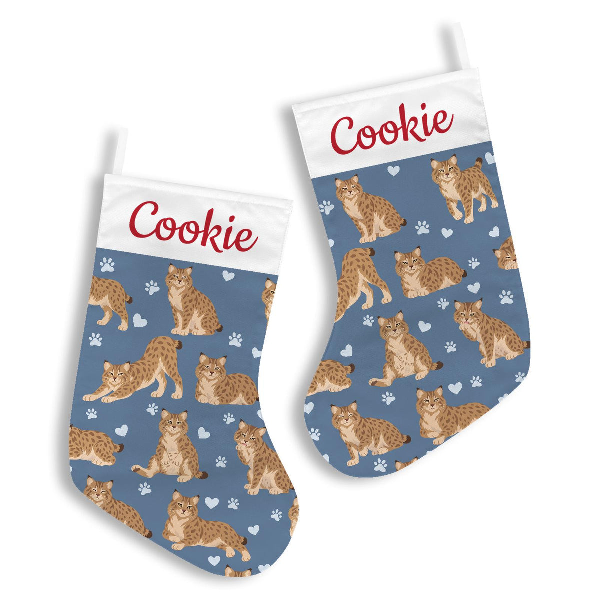 Pixie bob Christmas stocking on slate blue background with example name Cookie in red script on the white cuff; view 3.