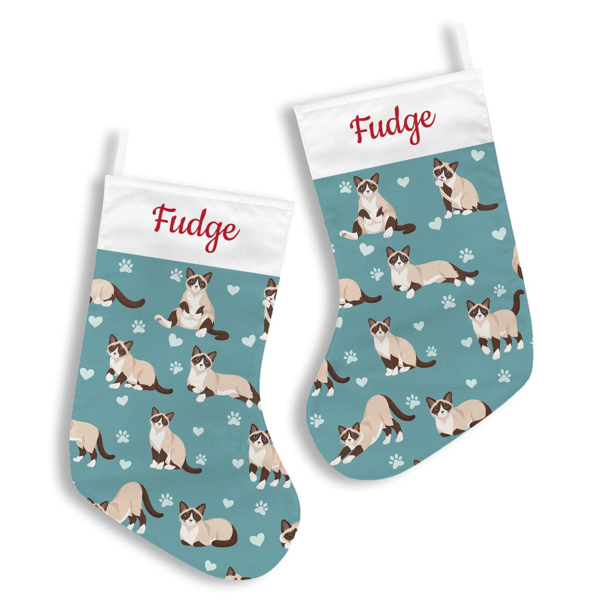 Snowshoe Christmas stocking on muted teal background with example name Fudge in red script on the white cuff; view 3.