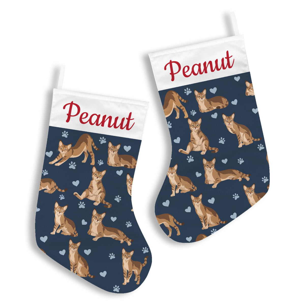 Chausie Christmas stocking on deep navy background with example name Peanut in red script on the white cuff; view 3.