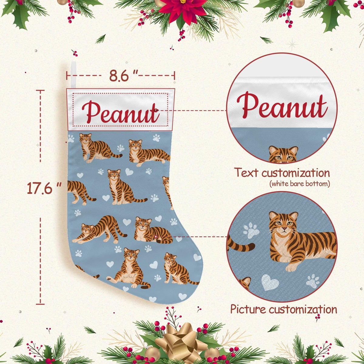 Toyger Christmas stocking on dusty blue background with example name Peanut in red script on the white cuff; view 4.