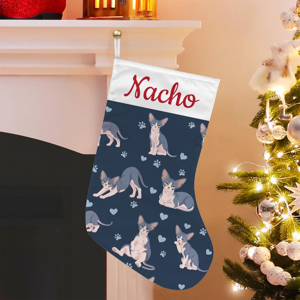 Sphynx Blue and white skin pigmentation Christmas stocking on deep navy background with example name Nacho in red script on the white cuff; view 1.