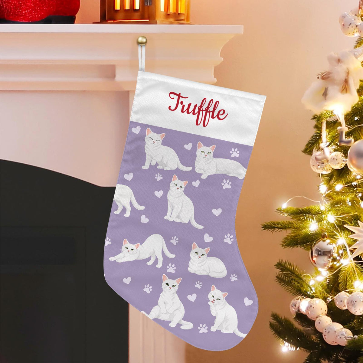 Domestic Shorthair White Christmas stocking on soft lavender background with example name Truffle in red script on the white cuff; view 1.