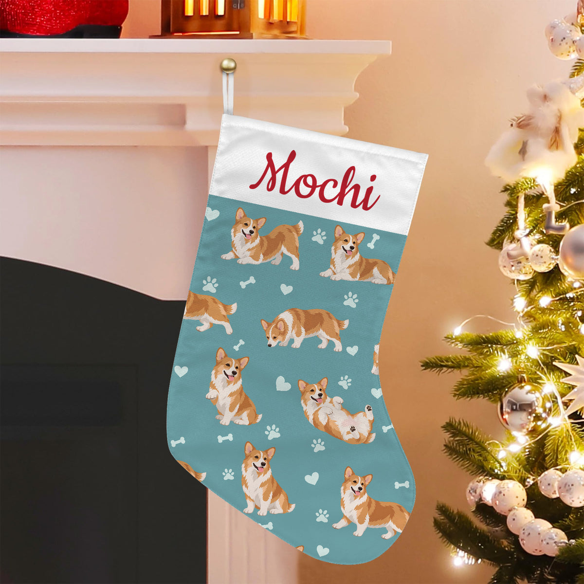 Pembroke Welsh Corgi Christmas stocking on muted teal background with example name Mochi in red script on the white cuff; view 5.