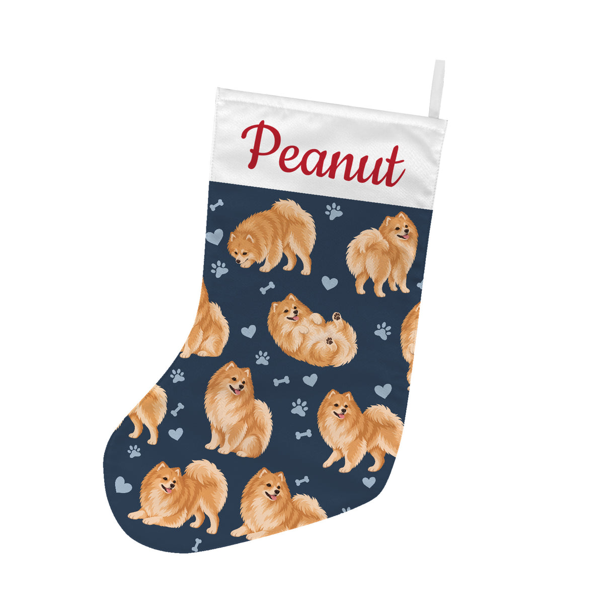 Pomeranian Christmas stocking on deep navy background with example name Peanut in red script on the white cuff; view 1.