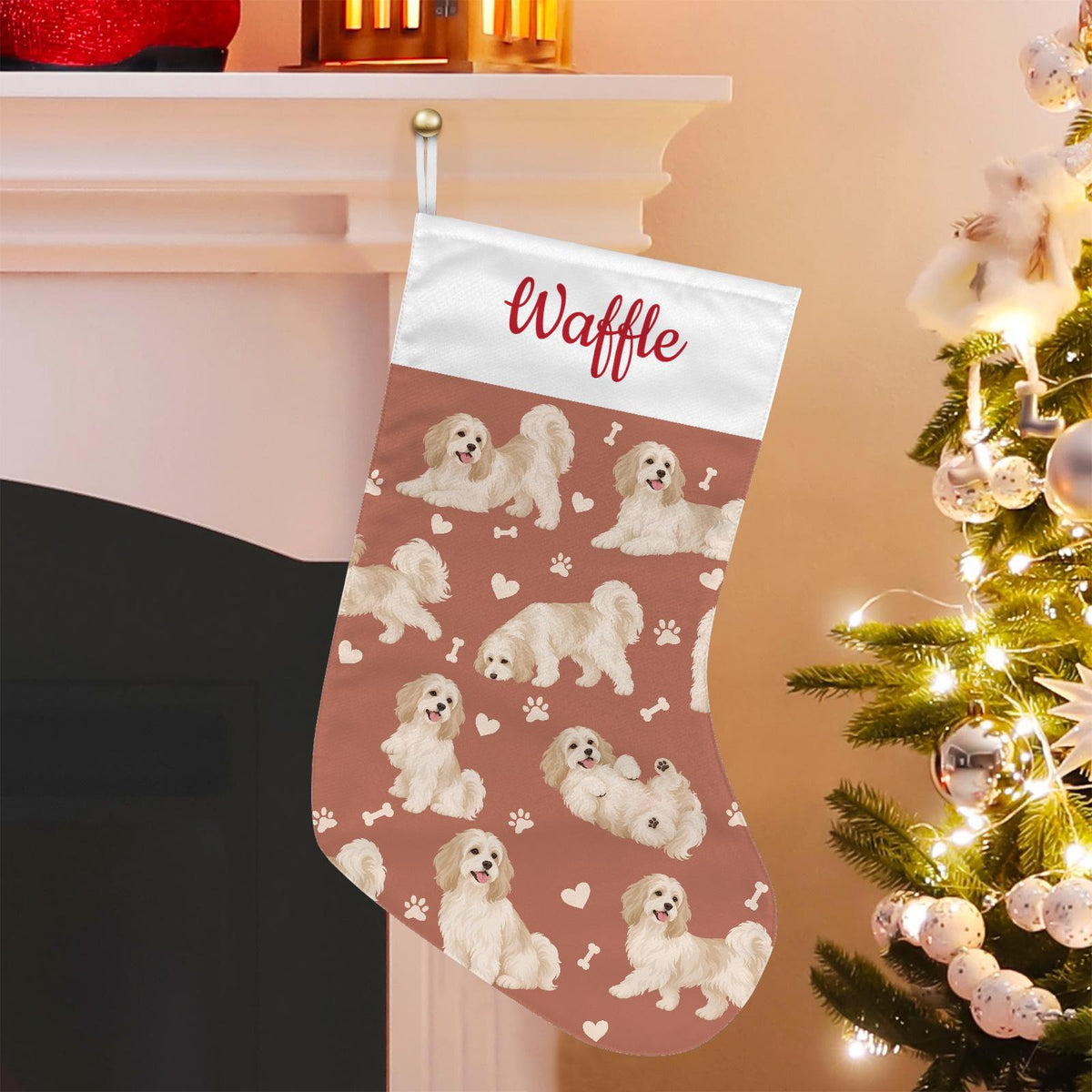 Havanese Christmas stocking on muted terracotta background with example name Waffle in red script on the white cuff; view 1.