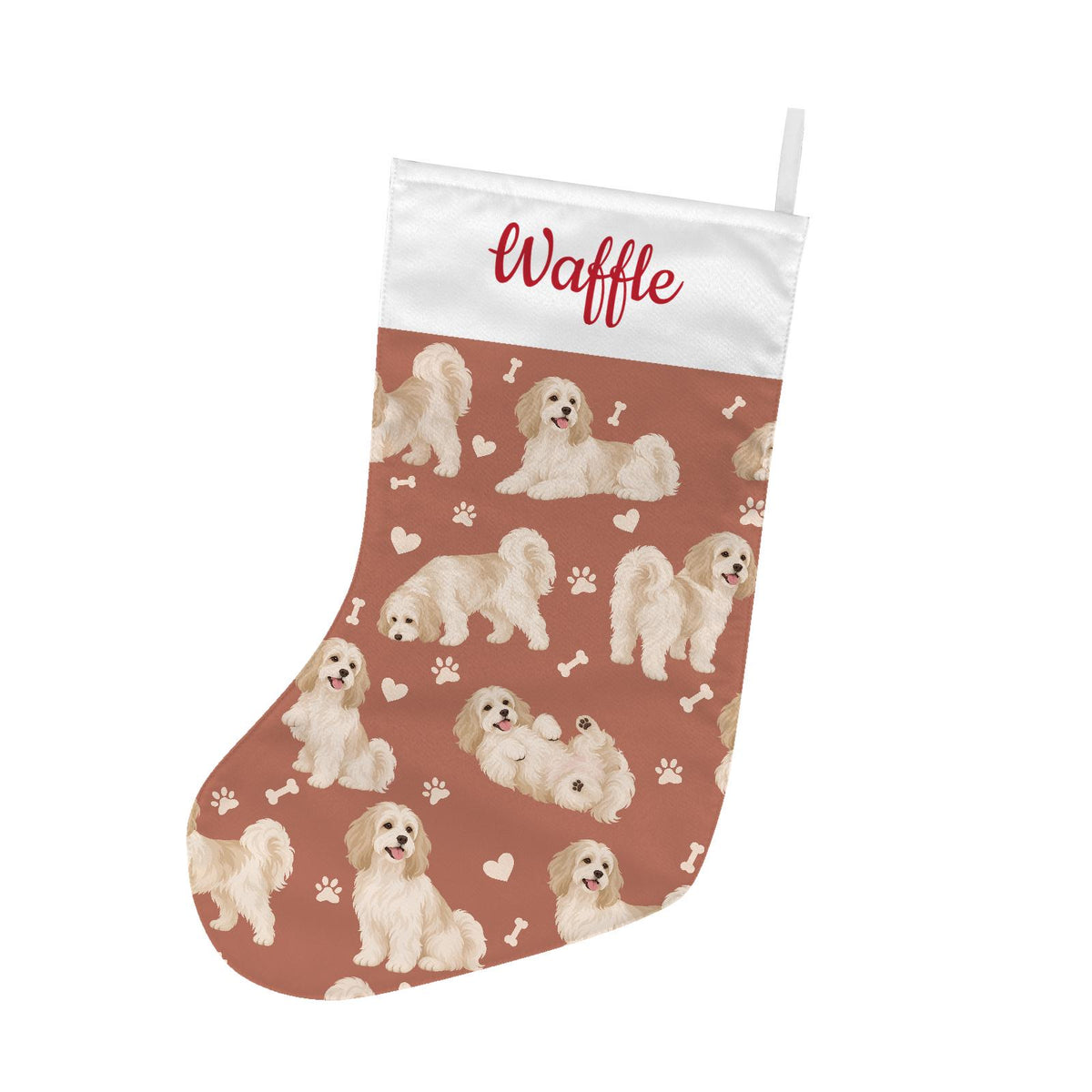 Havanese Christmas stocking on muted terracotta background with example name Waffle in red script on the white cuff; view 2.