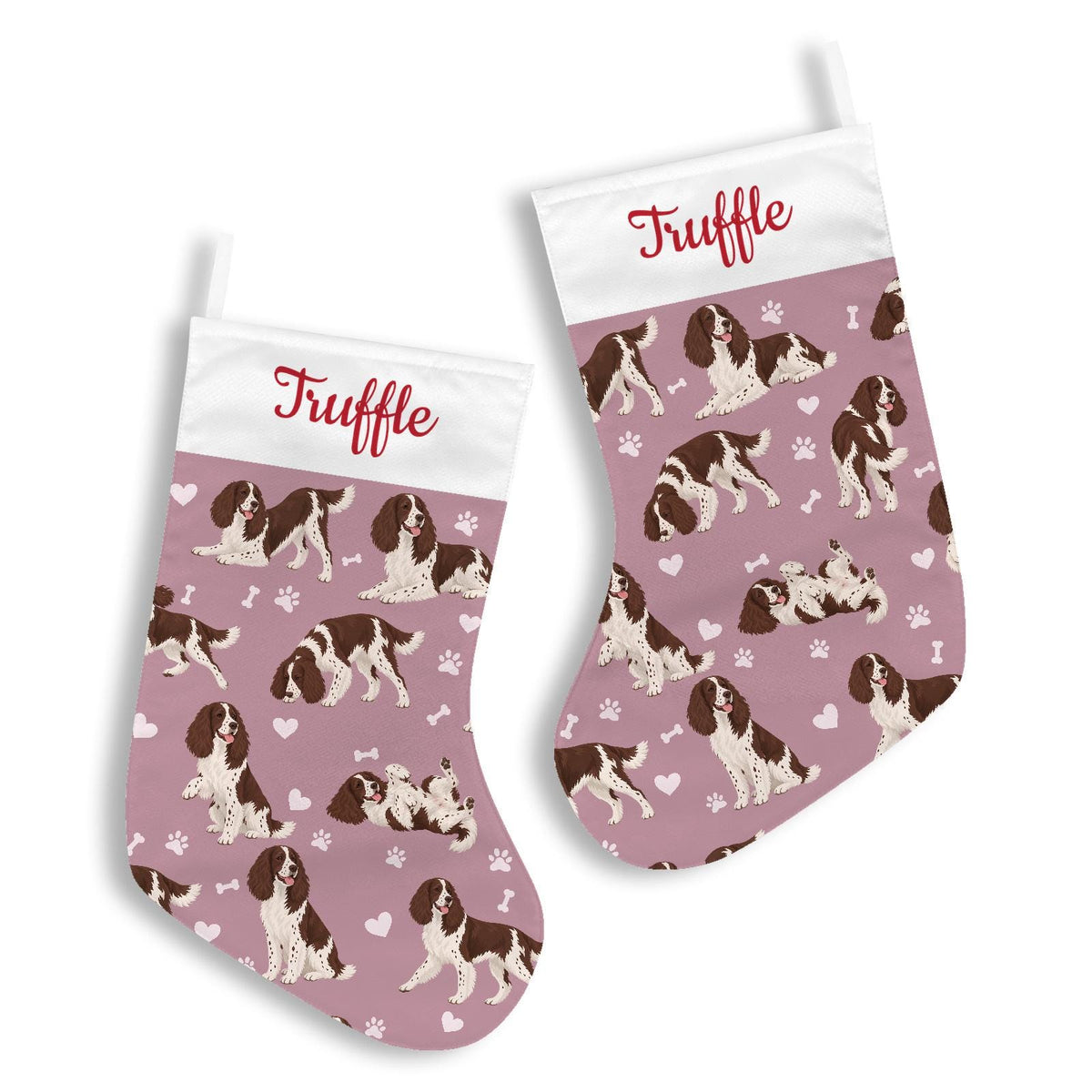 English Springer Spaniel Christmas stocking on dusty rose background with example name Truffle in red script on the white cuff; view 3.