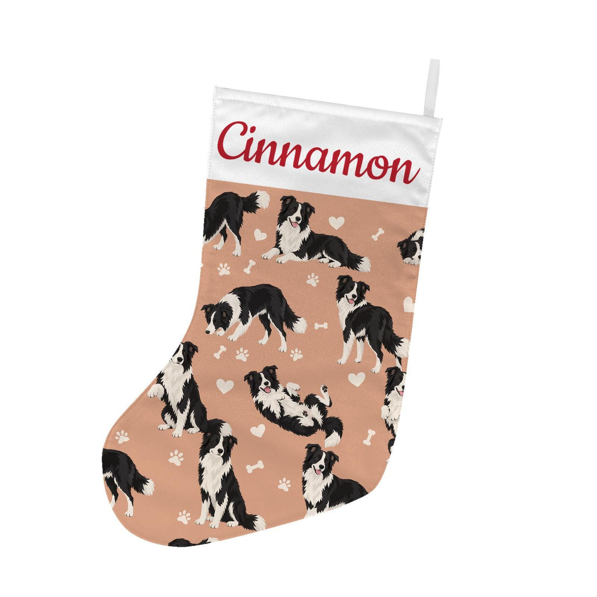 Border Collie Christmas stocking on peach background with example name Cinnamon in red script on the white cuff; view 2.