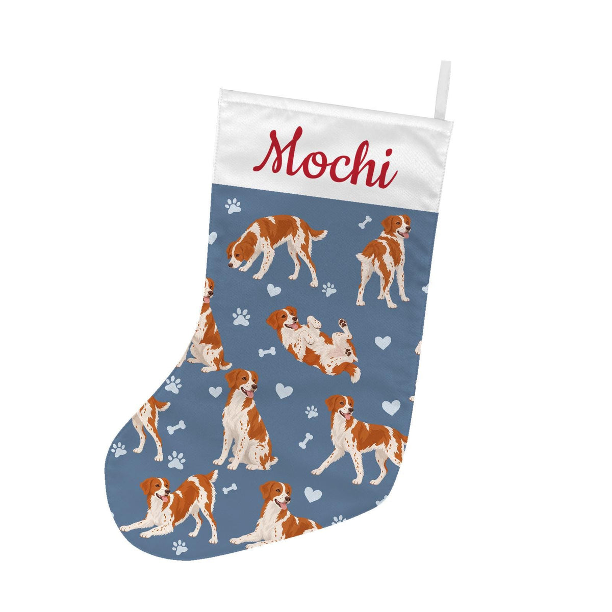 Brittany Christmas stocking on slate blue background with example name Mochi in red script on the white cuff; view 2.