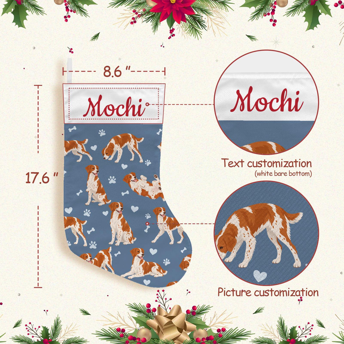 Brittany Christmas stocking on slate blue background with example name Mochi in red script on the white cuff; view 4.