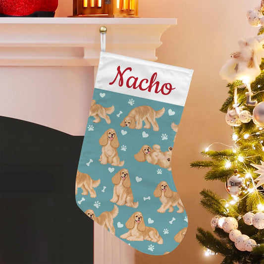 Cocker Spaniel Christmas stocking on muted teal background with example name Nacho in red script on the white cuff; view 1.