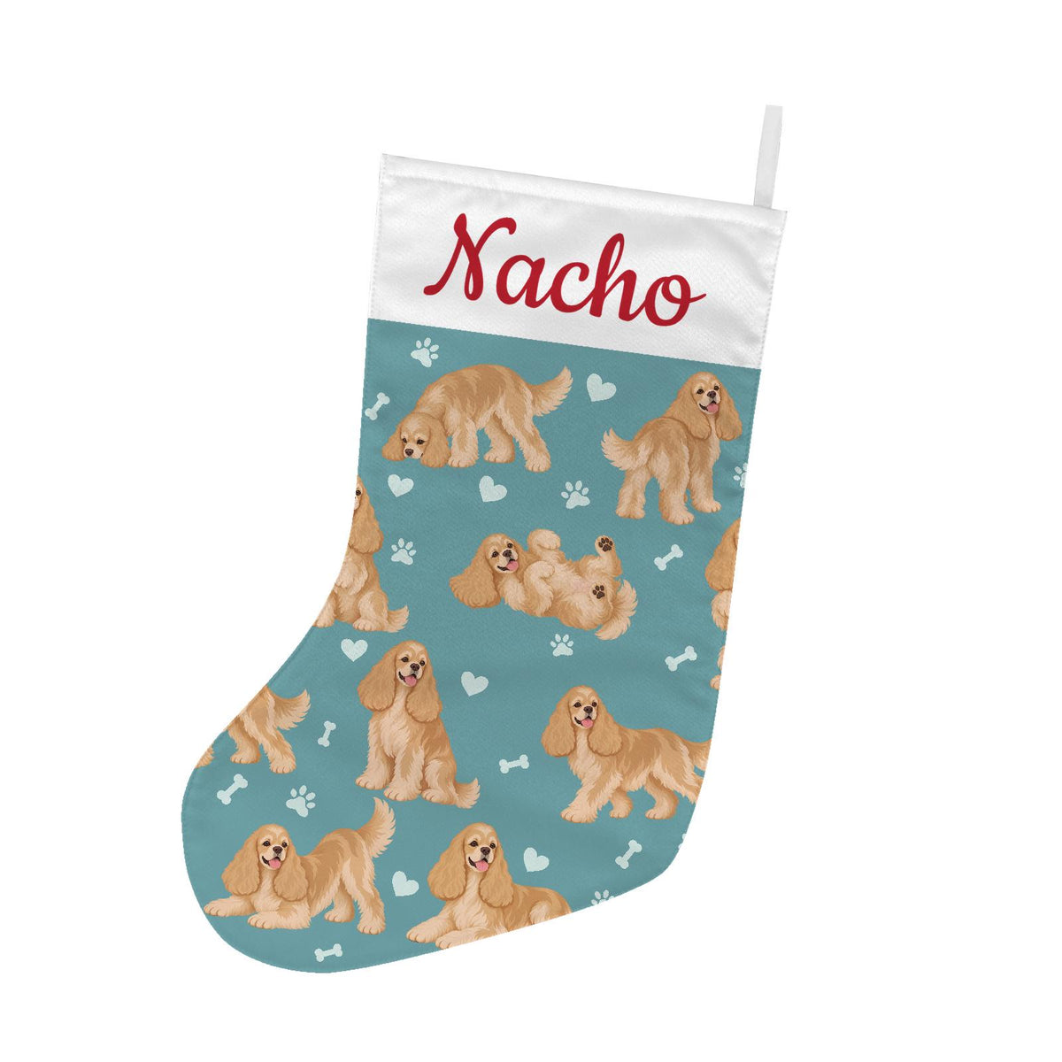 Cocker Spaniel Christmas stocking on muted teal background with example name Nacho in red script on the white cuff; view 2.