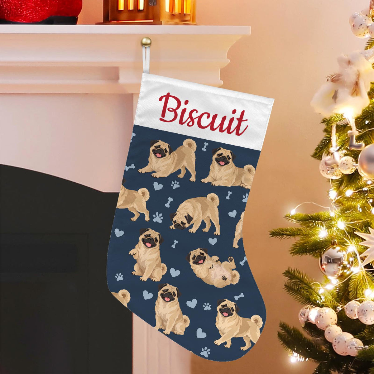Pug Christmas stocking on deep navy background with example name Biscuit in red script on the white cuff; view 1.