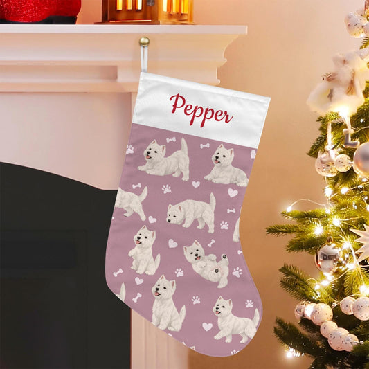 West Highland White Terrier Christmas stocking on dusty rose background with example name Pepper in red script on the white cuff; view 1.