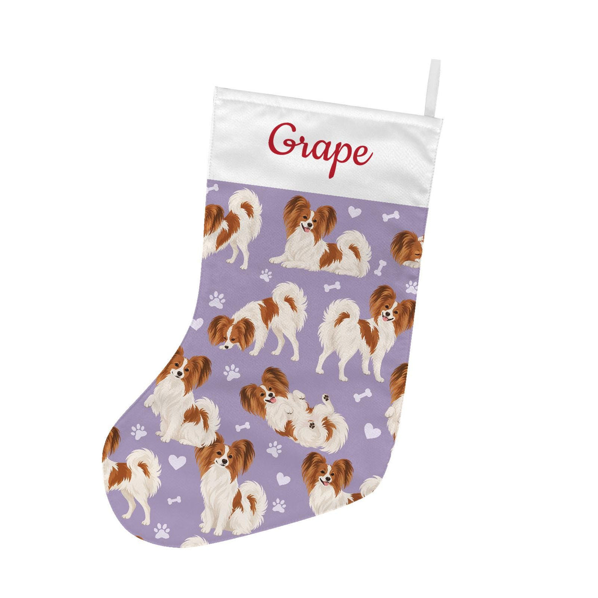 Papillon Christmas stocking on soft lavender background with example name Grape in red script on the white cuff; view 2.