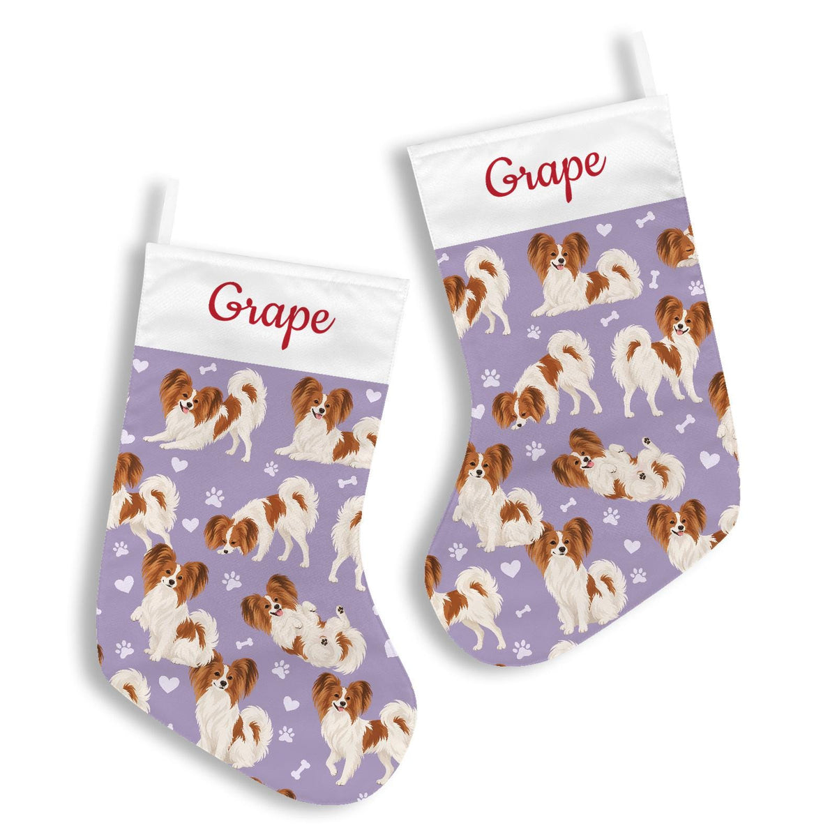 Papillon Christmas stocking on soft lavender background with example name Grape in red script on the white cuff; view 3.