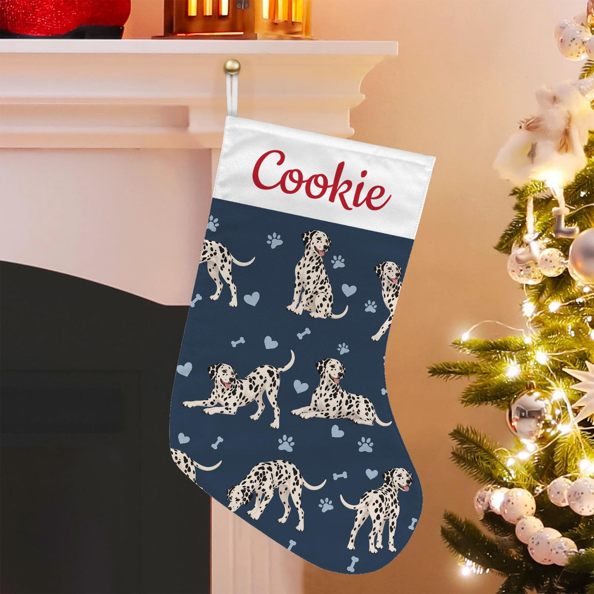 Dalmatian Christmas stocking on deep navy background with example name Cookie in red script on the white cuff; view 1.