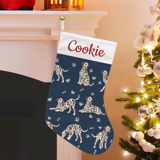 Dalmatian Christmas stocking on deep navy background with example name Cookie in red script on the white cuff; view 1.
