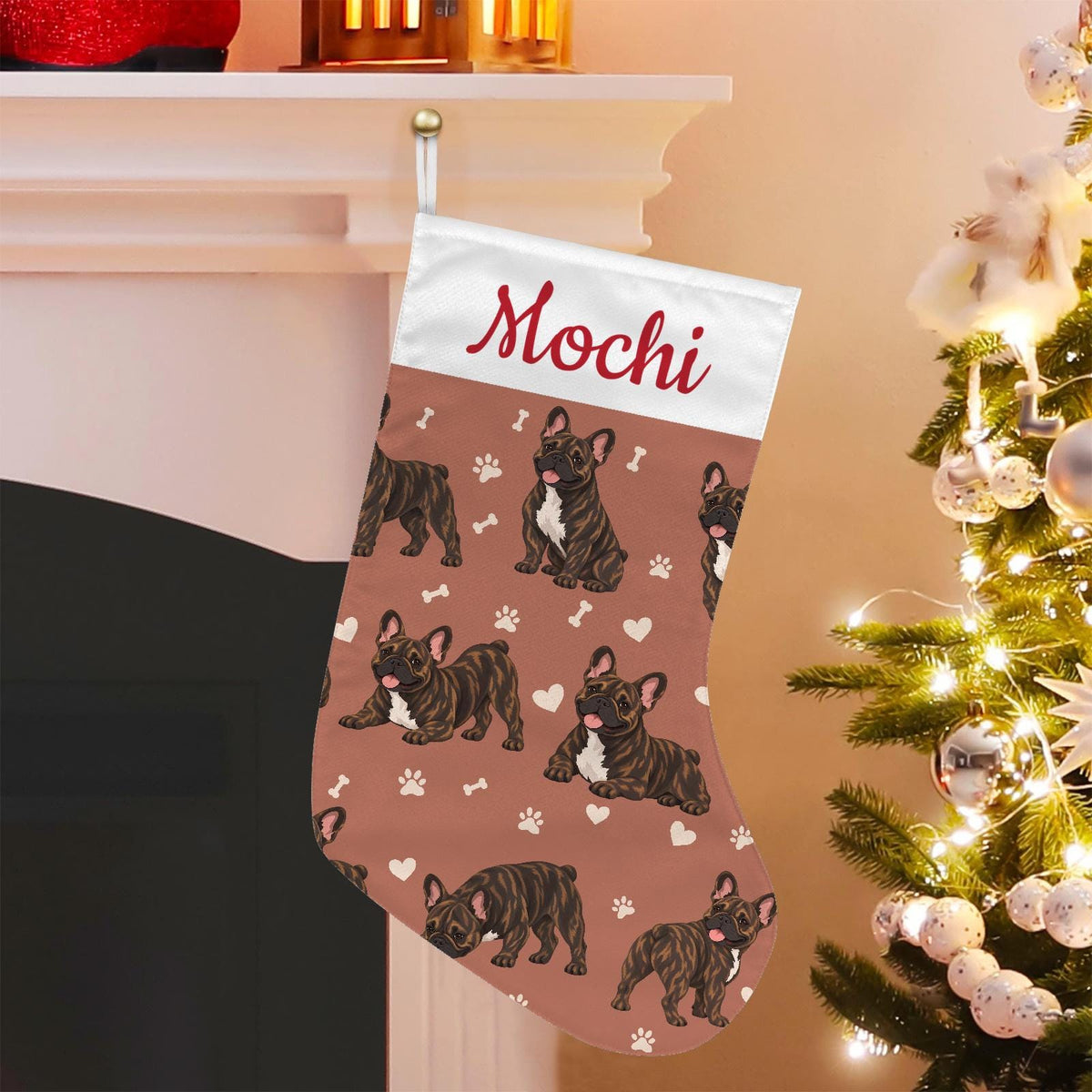 French Bulldog Brindle Christmas stocking on muted terracotta background with example name Mochi in red script on the white cuff; view 1.