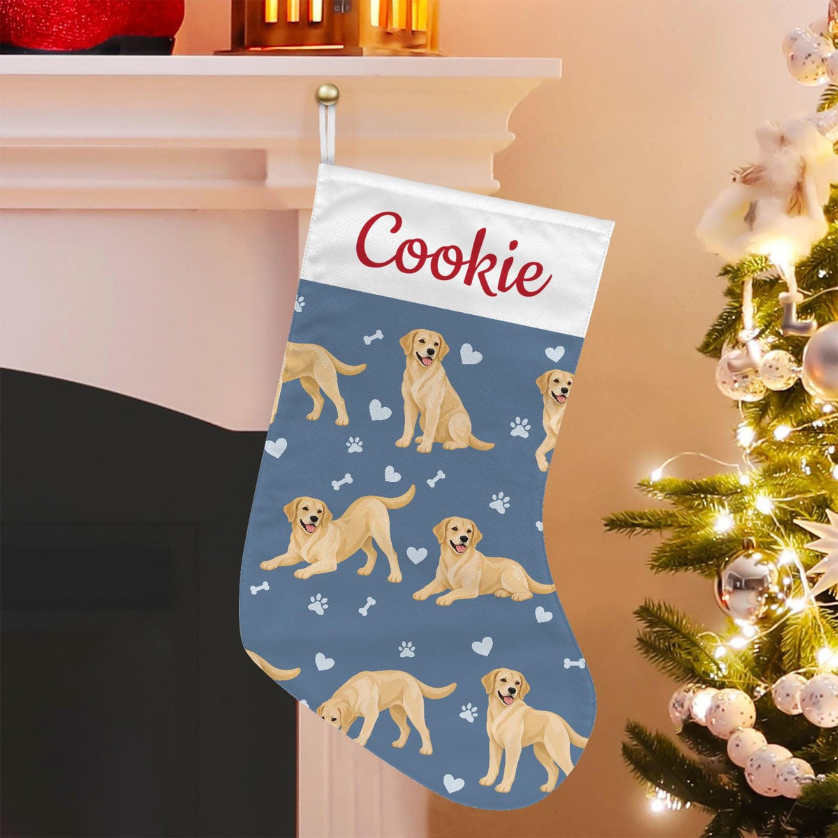 Labrador Retriever Yellow Christmas stocking on slate blue background with example name Cookie in red script on the white cuff; view 1.