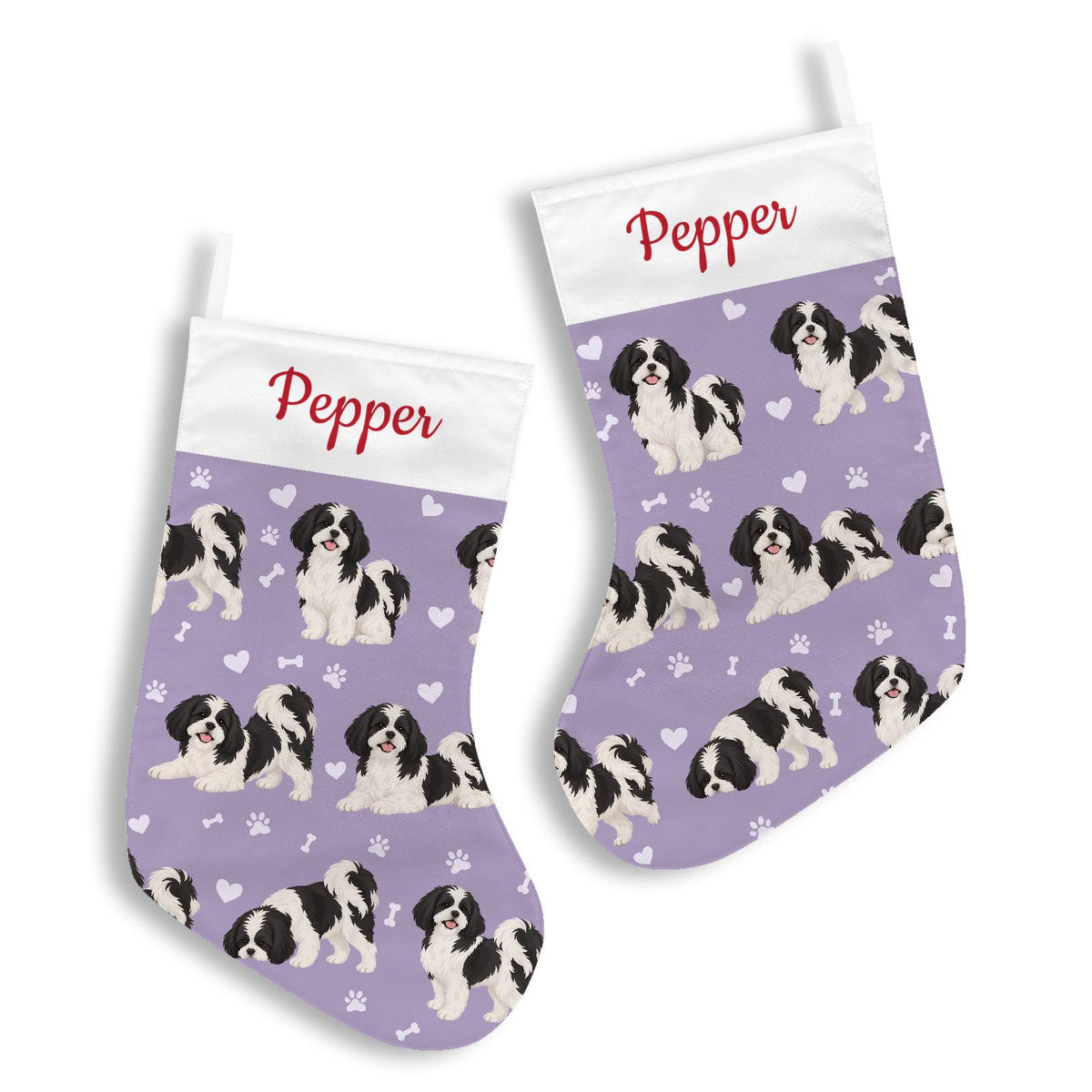 Shih Tzu Black and White Christmas stocking on soft lavender background with example name Pepper in red script on the white cuff; view 3.