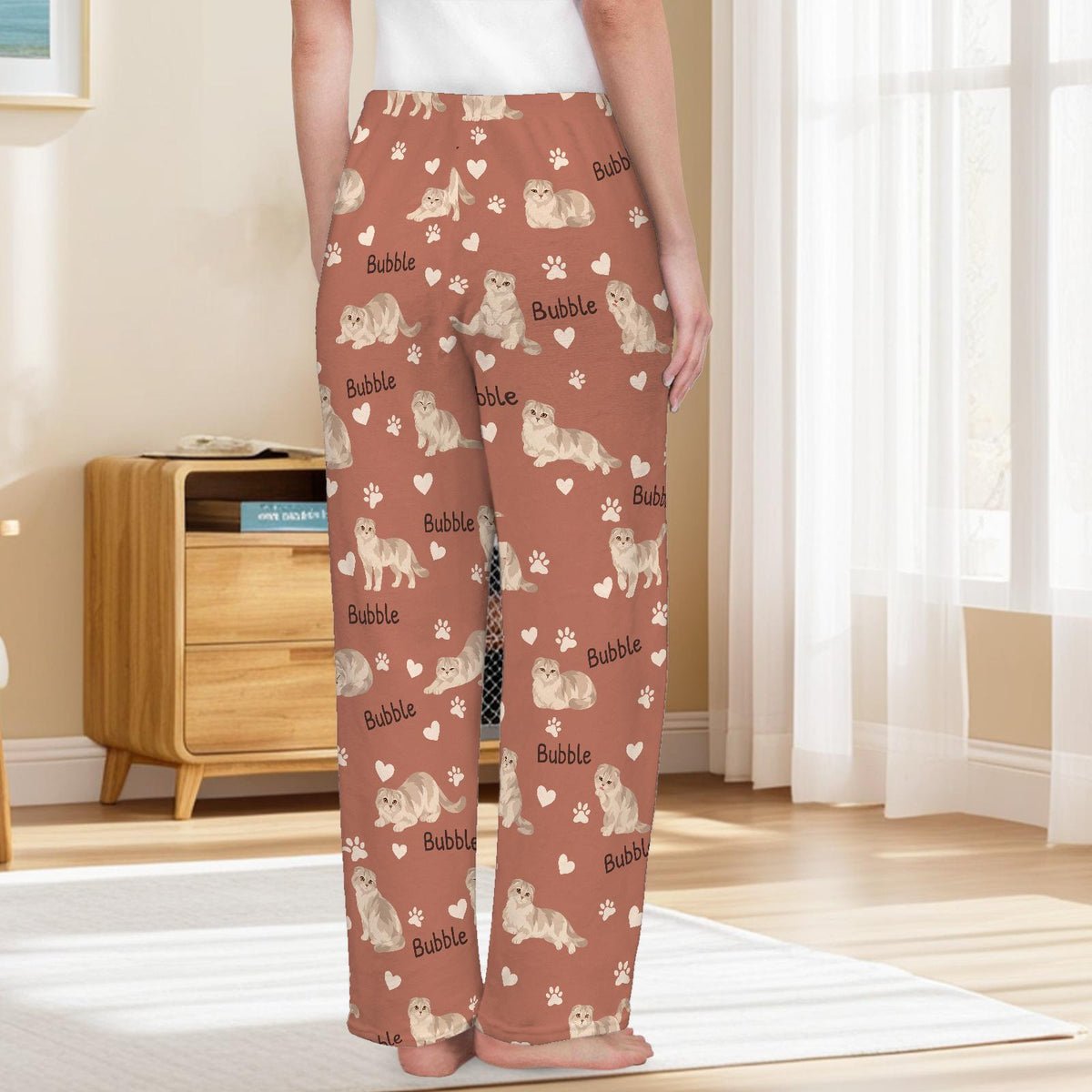 Scottish Fold personalized pet name fleece pajama trousers, back lifestyle view.