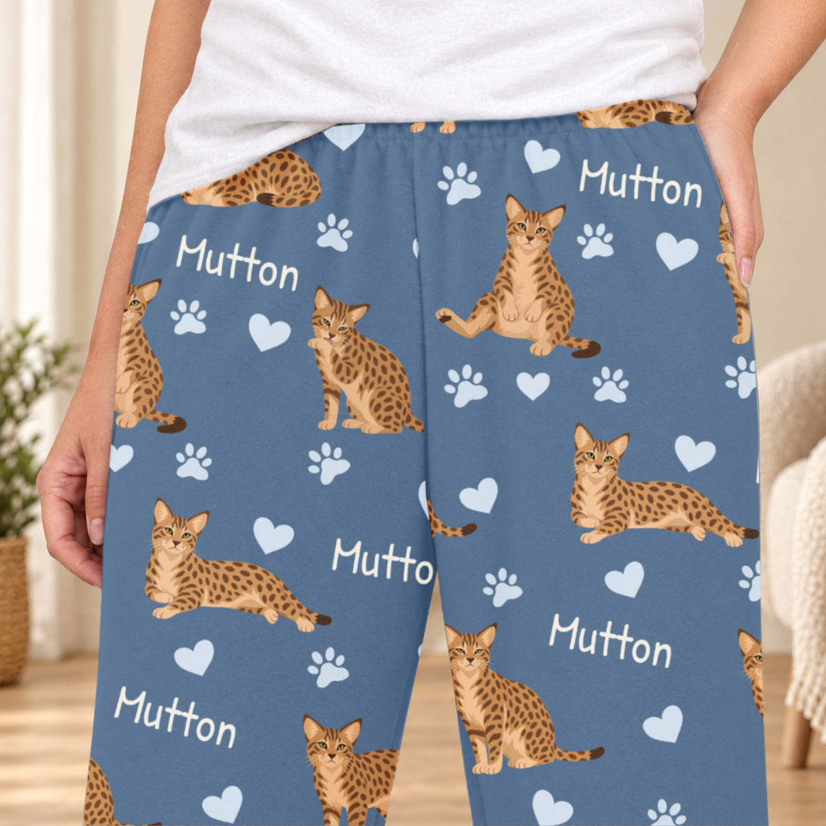 Ocicat personalized fleece pajama close-up showing breed artwork and example pet name