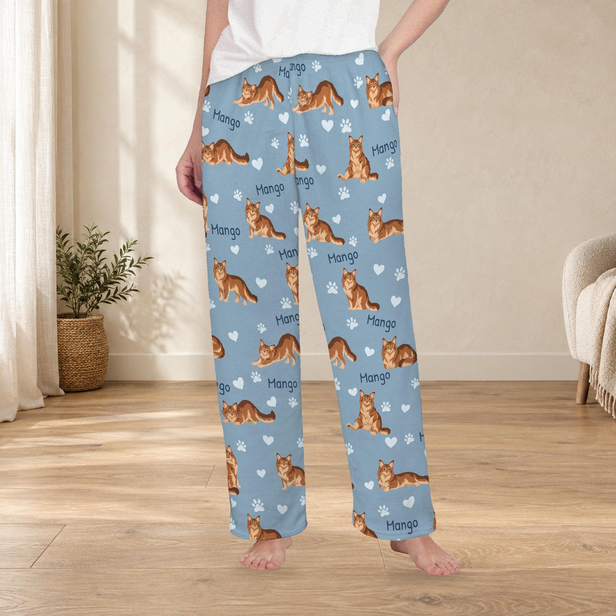 Somali personalized fleece pajama trousers on a model; women's fit, front view. Cozy neutral room background.