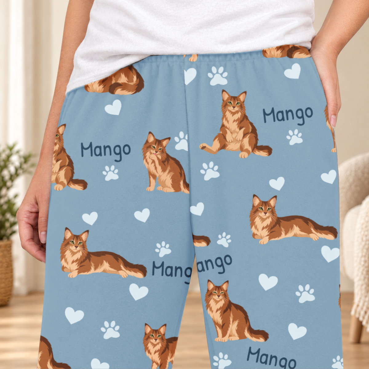 Somali personalized fleece pajama close-up showing breed artwork and example pet name