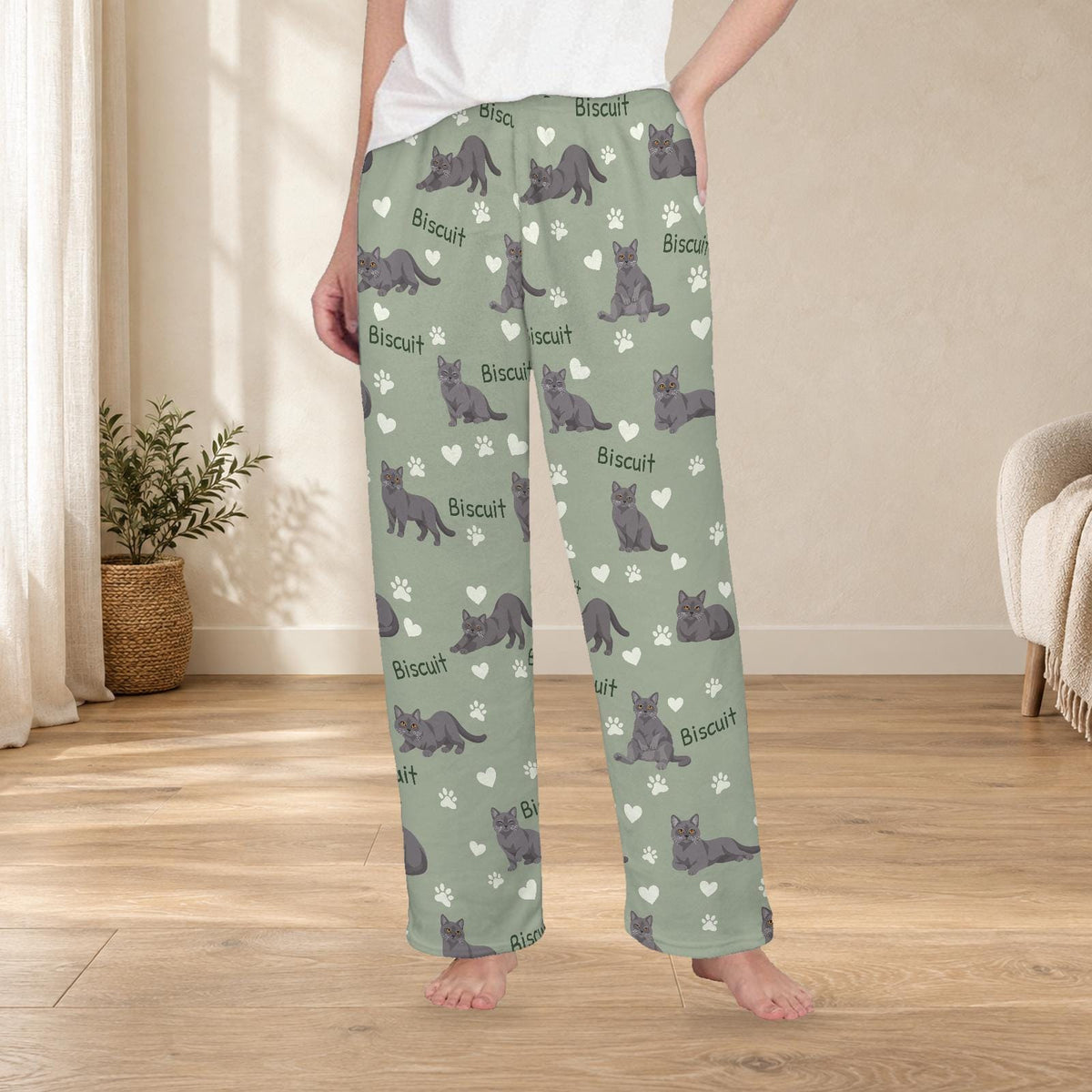 Chartreux personalized fleece pajama trousers on a model; women's fit, front view. Cozy neutral room background.