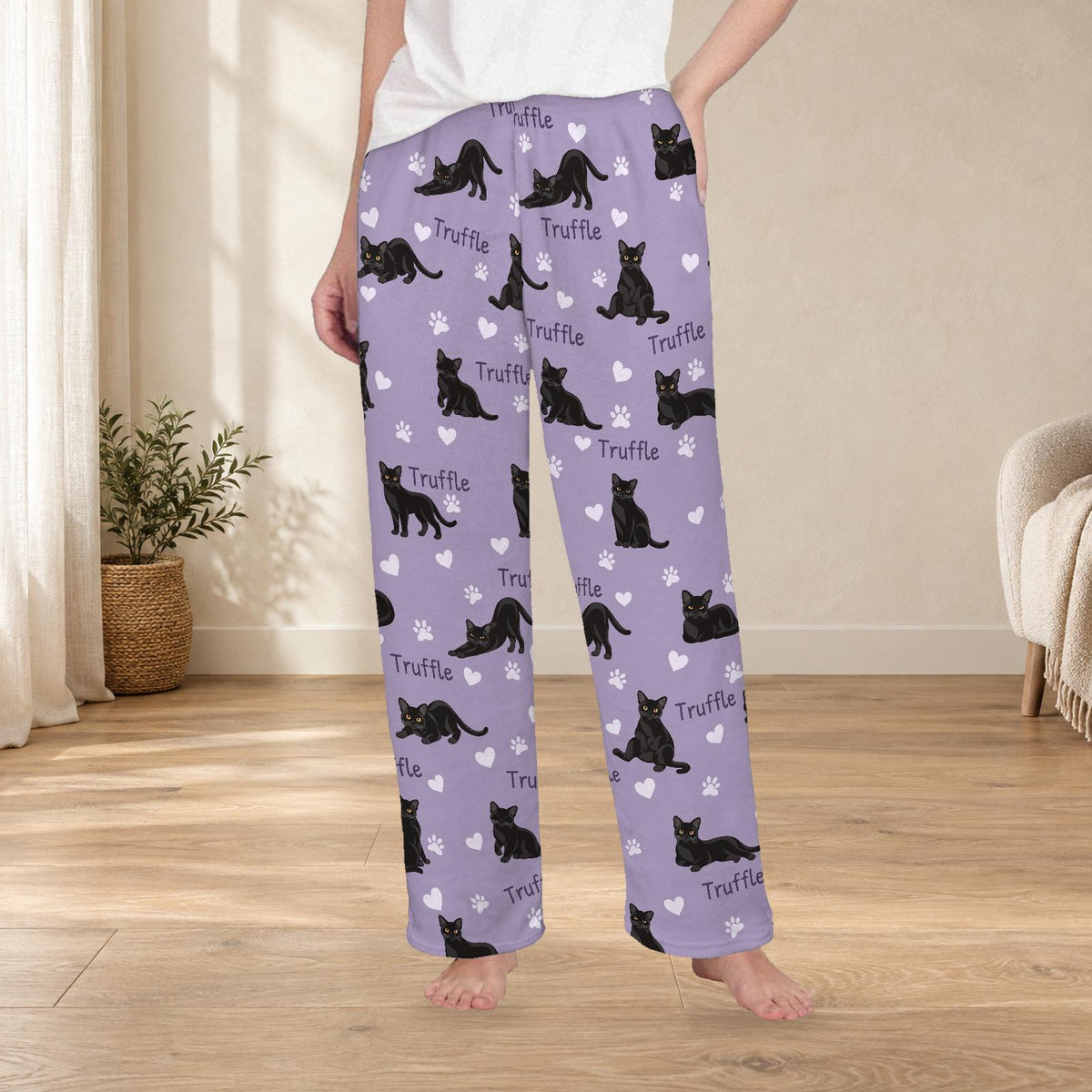Bombay personalized fleece pajama trousers on a model; women's fit, front view. Cozy neutral room background.