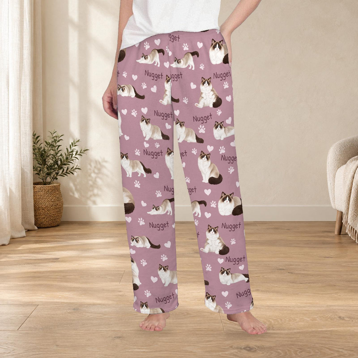 Ragdoll personalized fleece pajama trousers on a model; women's fit, front view. Cozy neutral room background.