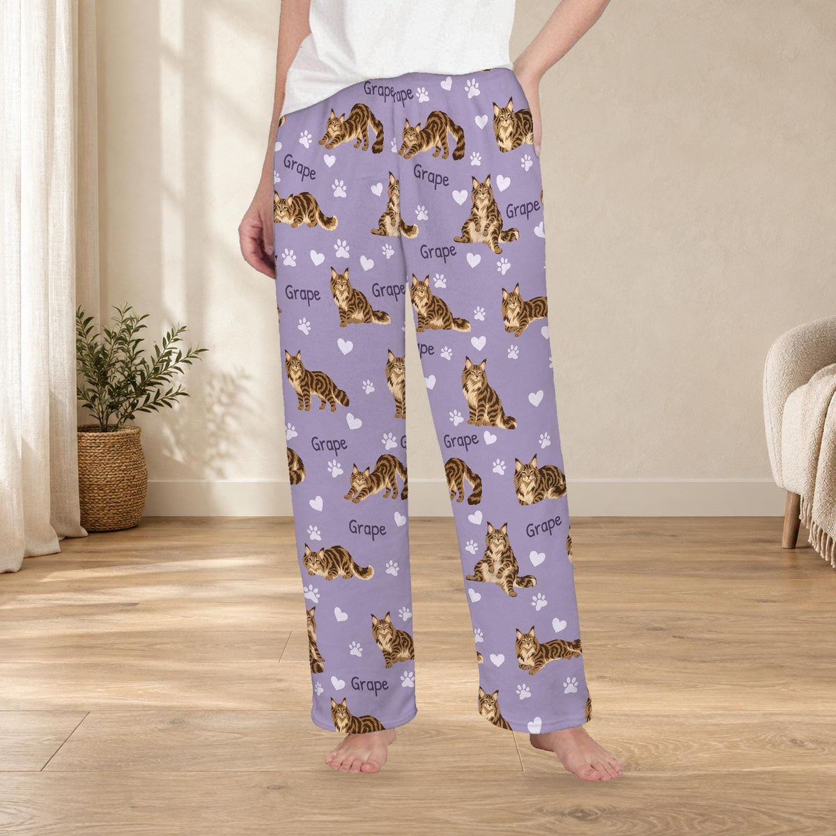 Maine Coon personalized fleece pajama trousers on a model; women's fit, front view. Cozy neutral room background.
