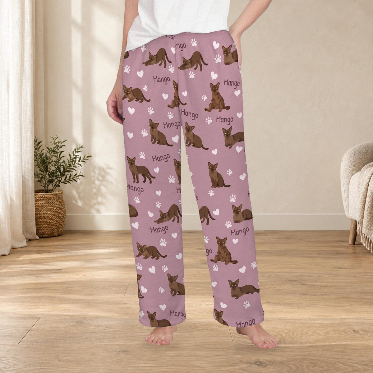 European Burmese personalized fleece pajama trousers on a model; women's fit, front view. Cozy neutral room background.