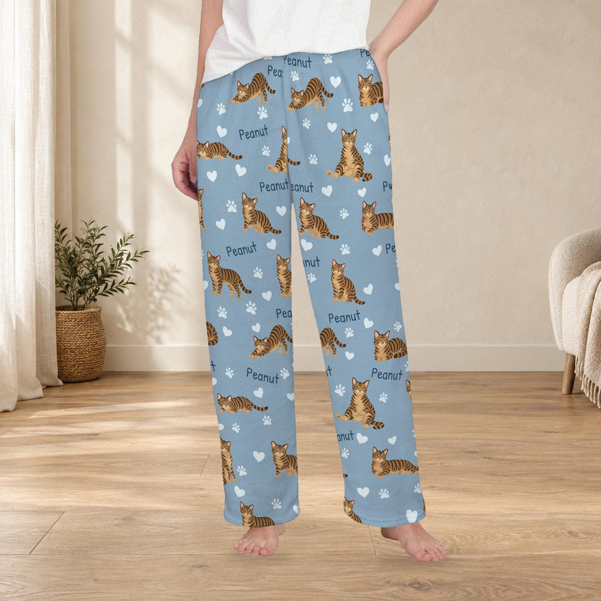 Domestic Shorthair personalized fleece pajama trousers on a model; women's fit, front view. Cozy neutral room background.
