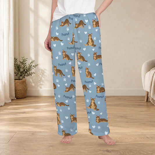 Domestic Shorthair personalized fleece pajama trousers on a model; women's fit, front view. Cozy neutral room background.